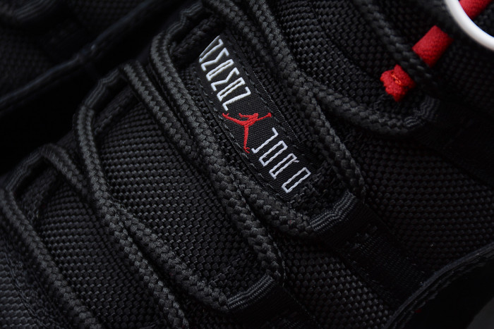 Air Jordan 11 Retro Low "Bred" Black/ Red mens 528895-012