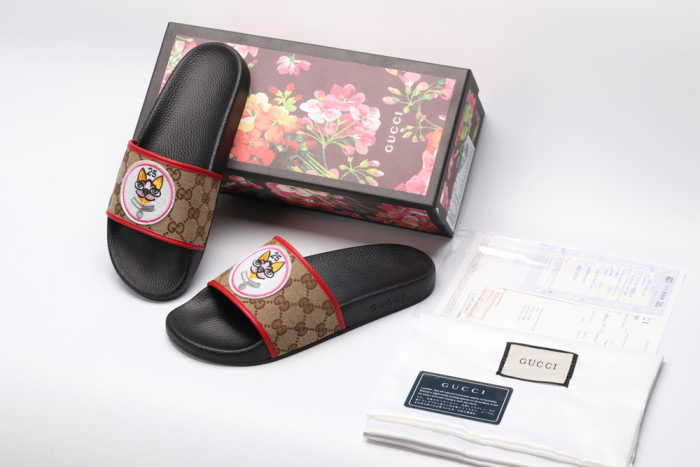 G*u*i slippers