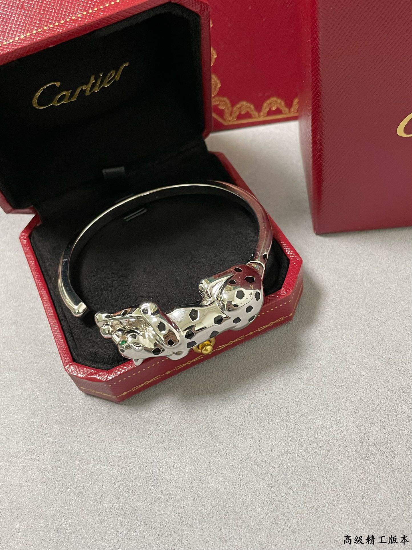 Ca*t1er Light Gold Spotted Leopard Bracelet