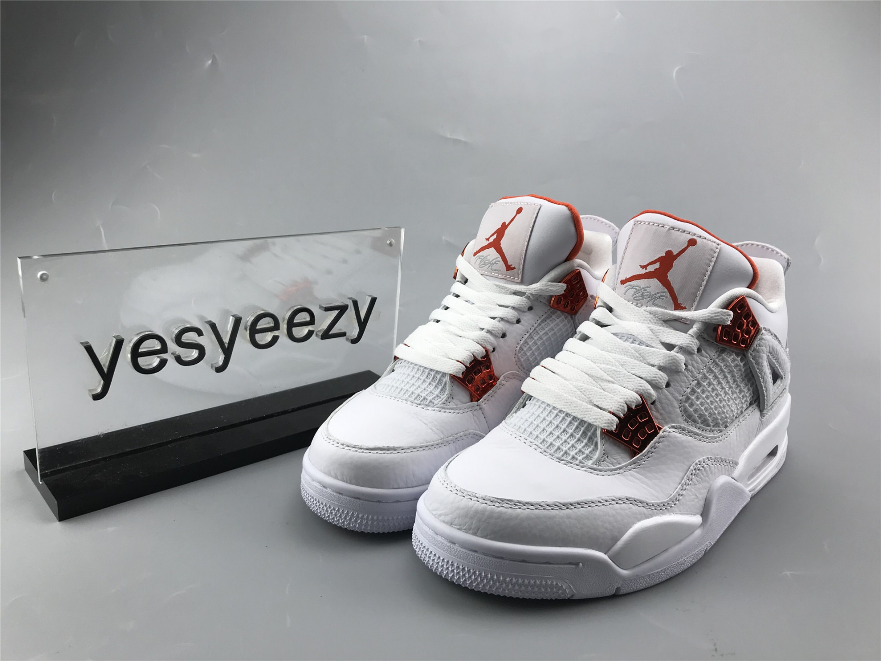 UA AIR JORDAN 4 RETRO METALLIC ORANGE