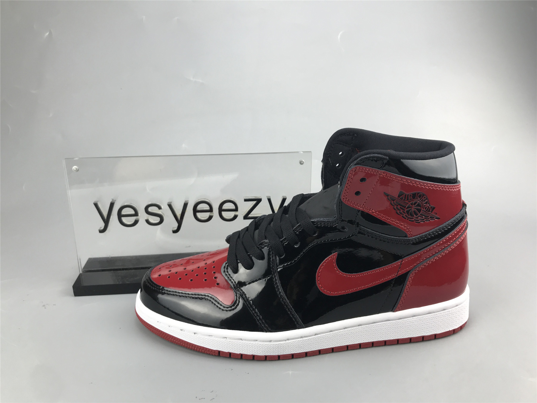UA AIR JORDAN 1 RETRO HIGH OG PATENT 