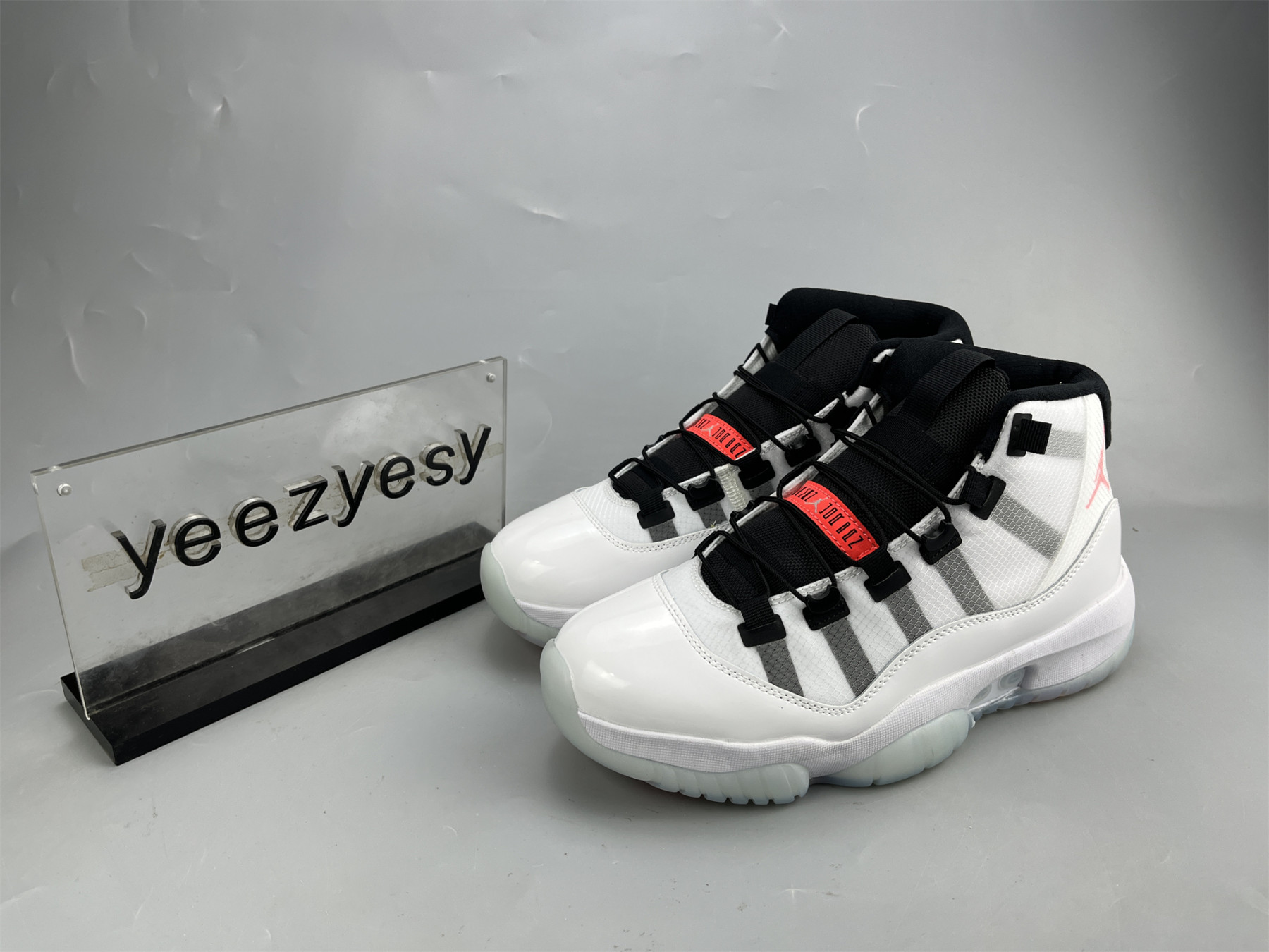 UA AIR JORDAN 11 ADAPT 