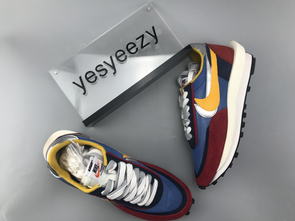 UA NIKE LDWAFFLE/SACAI "VARSITY BLUE"