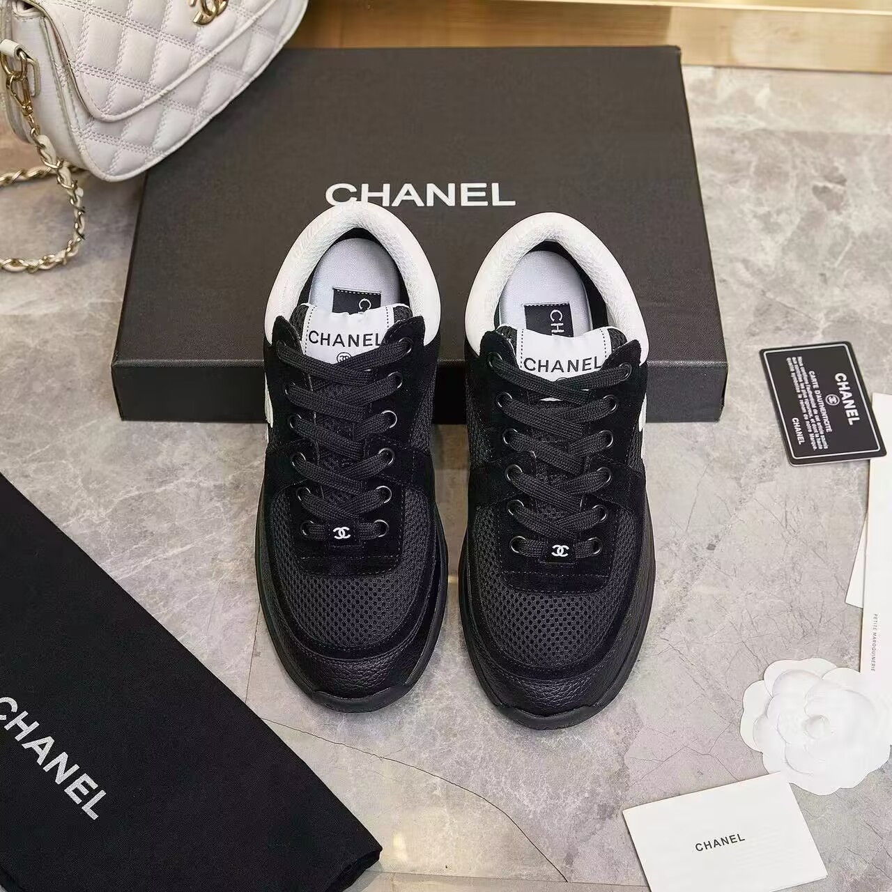 UA Ch**el SNEAKER