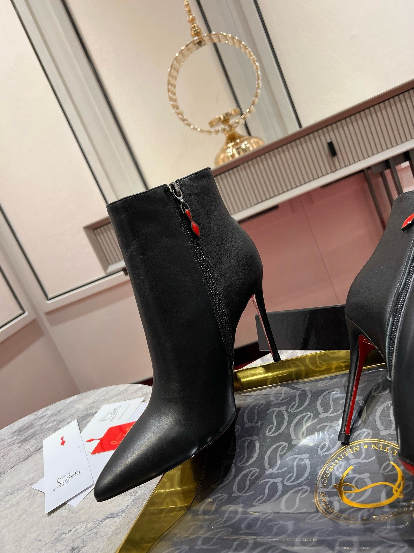UA Chr1st1an Louboutin Miss Z Booty 100 mm Low Boots Calf leather Black