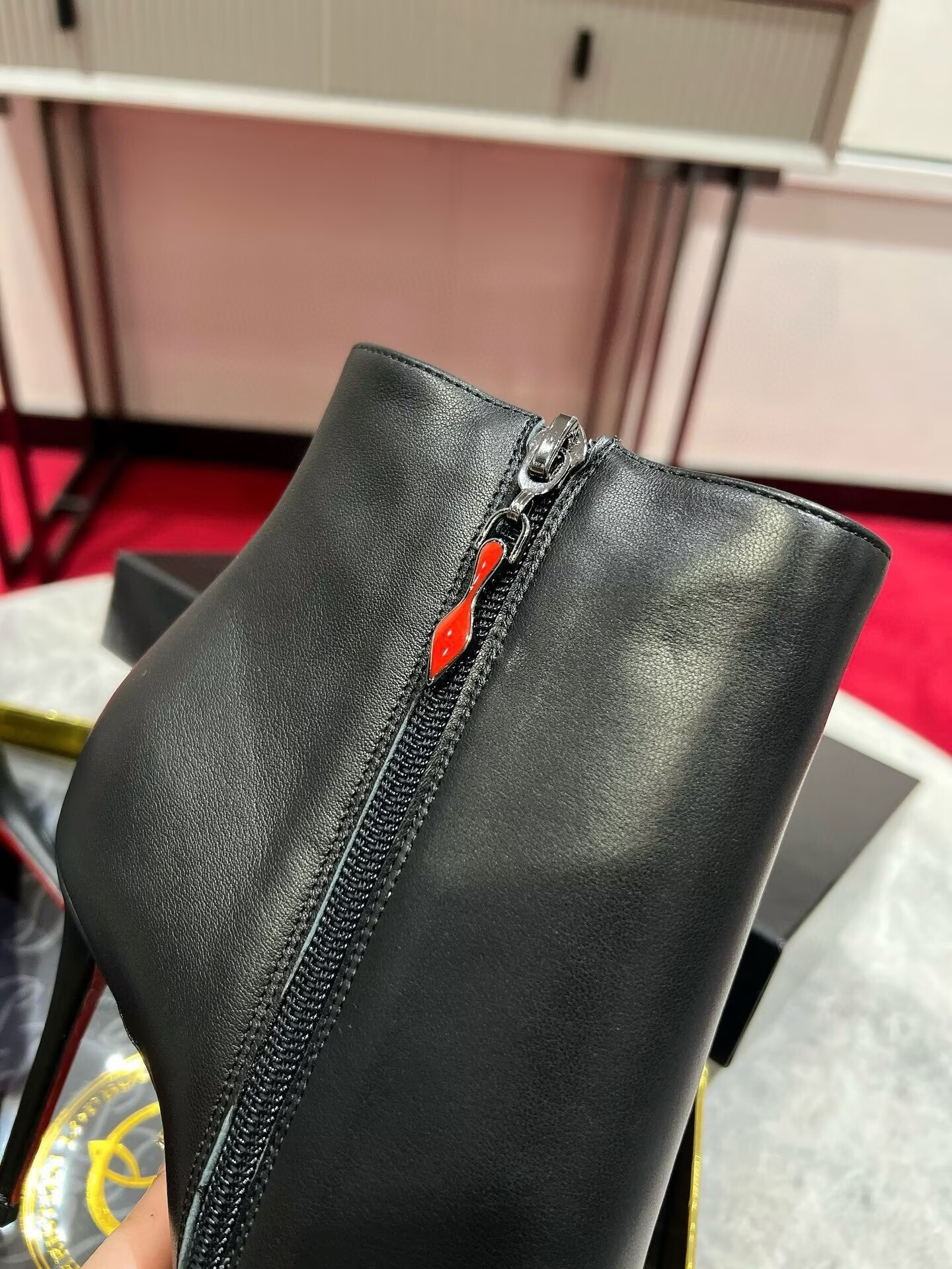 UA Chr1st1an Louboutin Miss Z Booty 100 mm Low Boots Calf leather Black