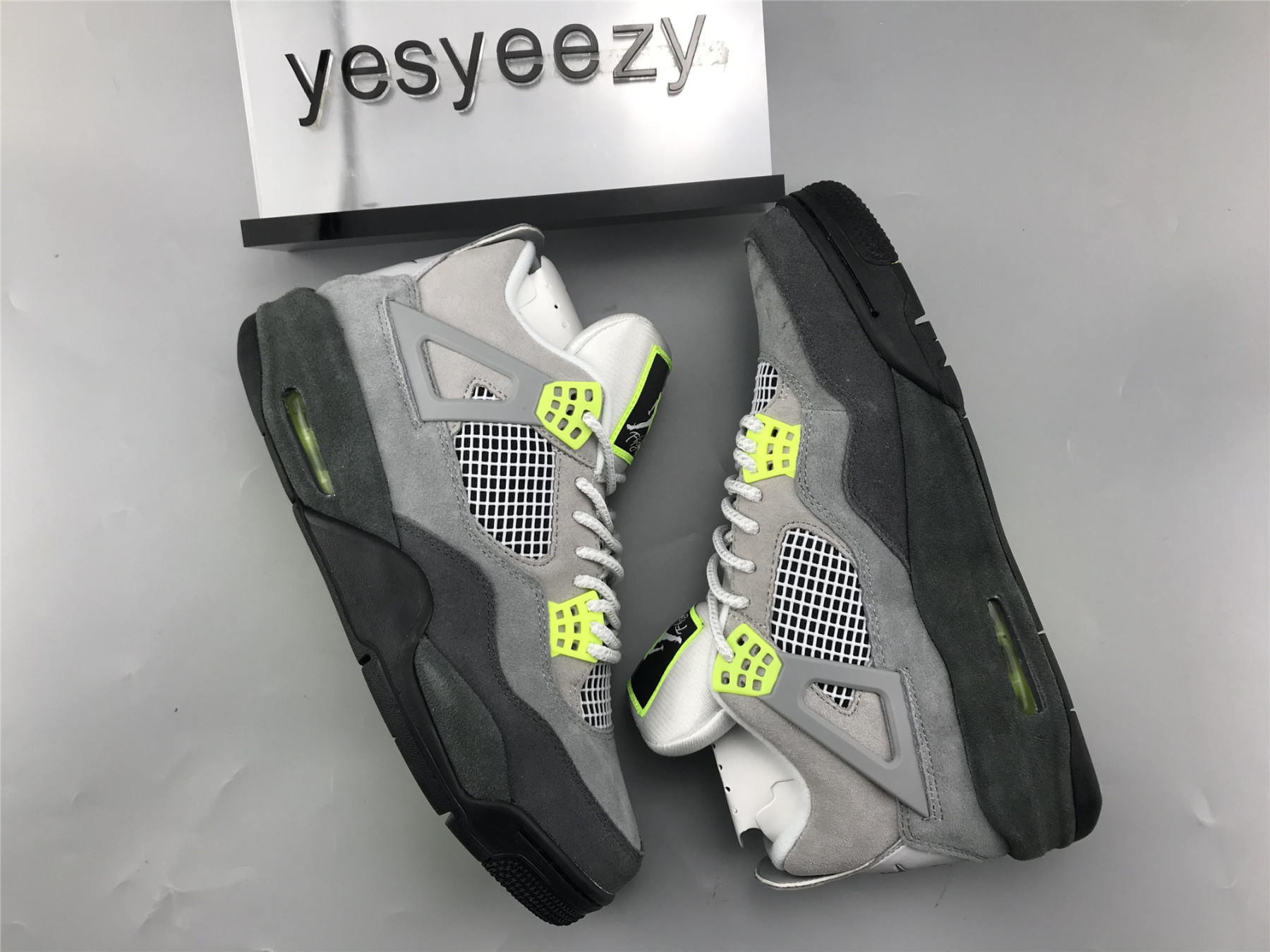 UA AIR JORDAN 4 RETRO LE "NEON 95"