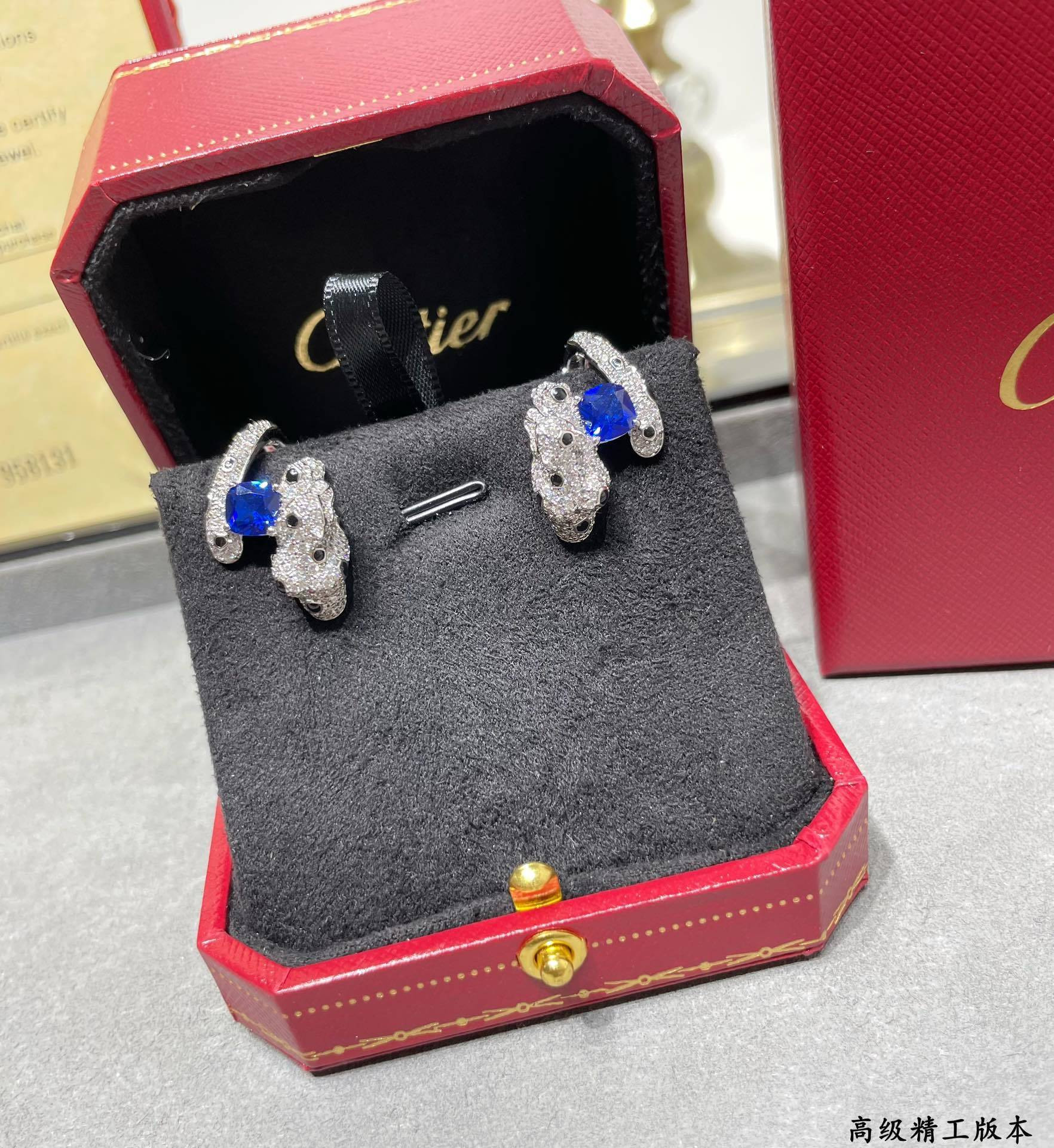 Ca*t1er Blue D1am0nd Panther Earrings