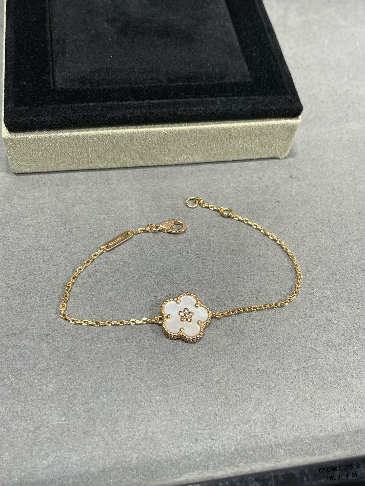 V*n Cl**f & Arpels plum blossom bracelet