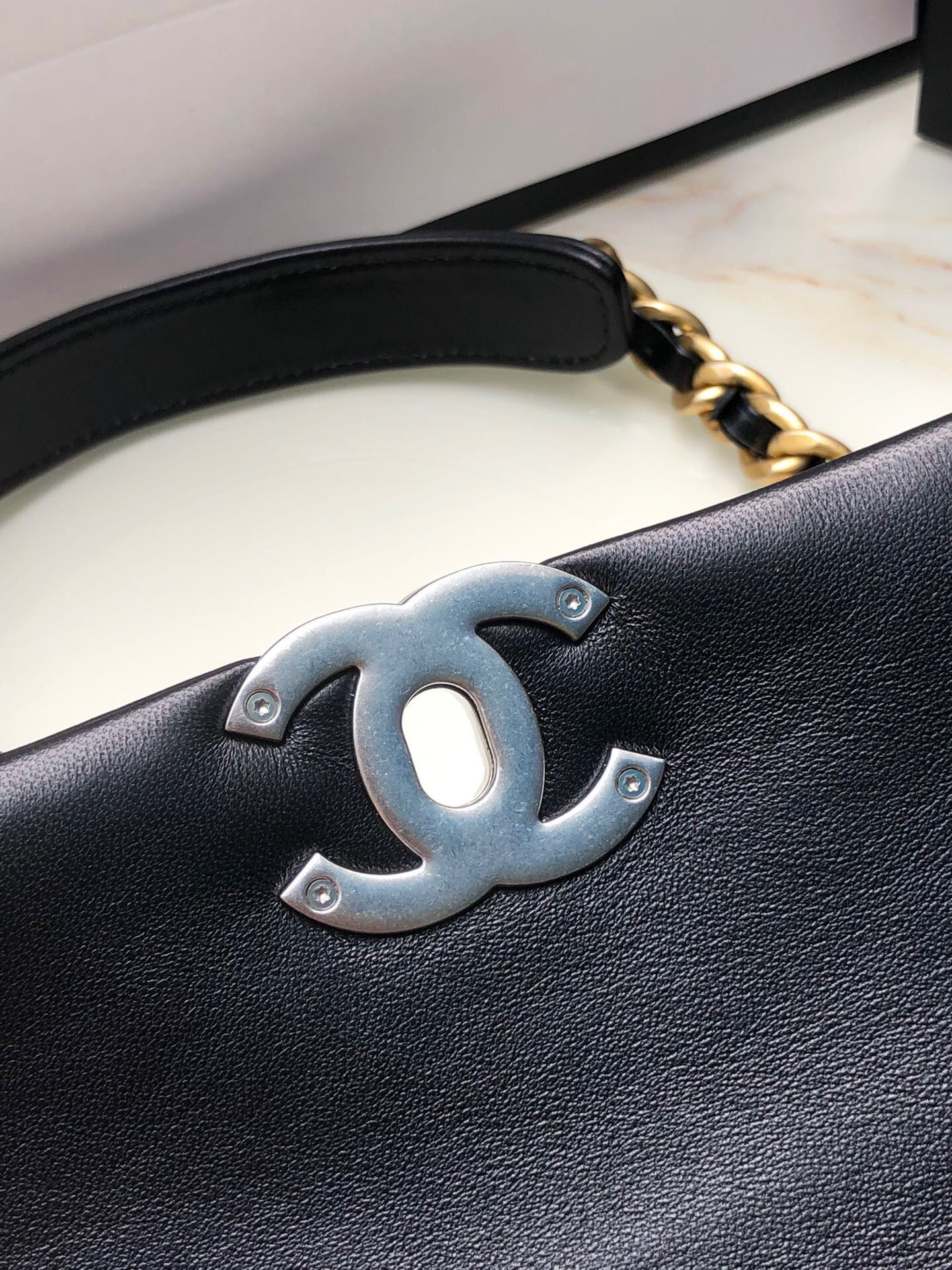 Ch**el 19 HANDBAG Shiny Leather, Gold-Tone, Silver-Tone & Ruthenium-Finish Metal Black 6.2 × 10.1 × 3.5 in