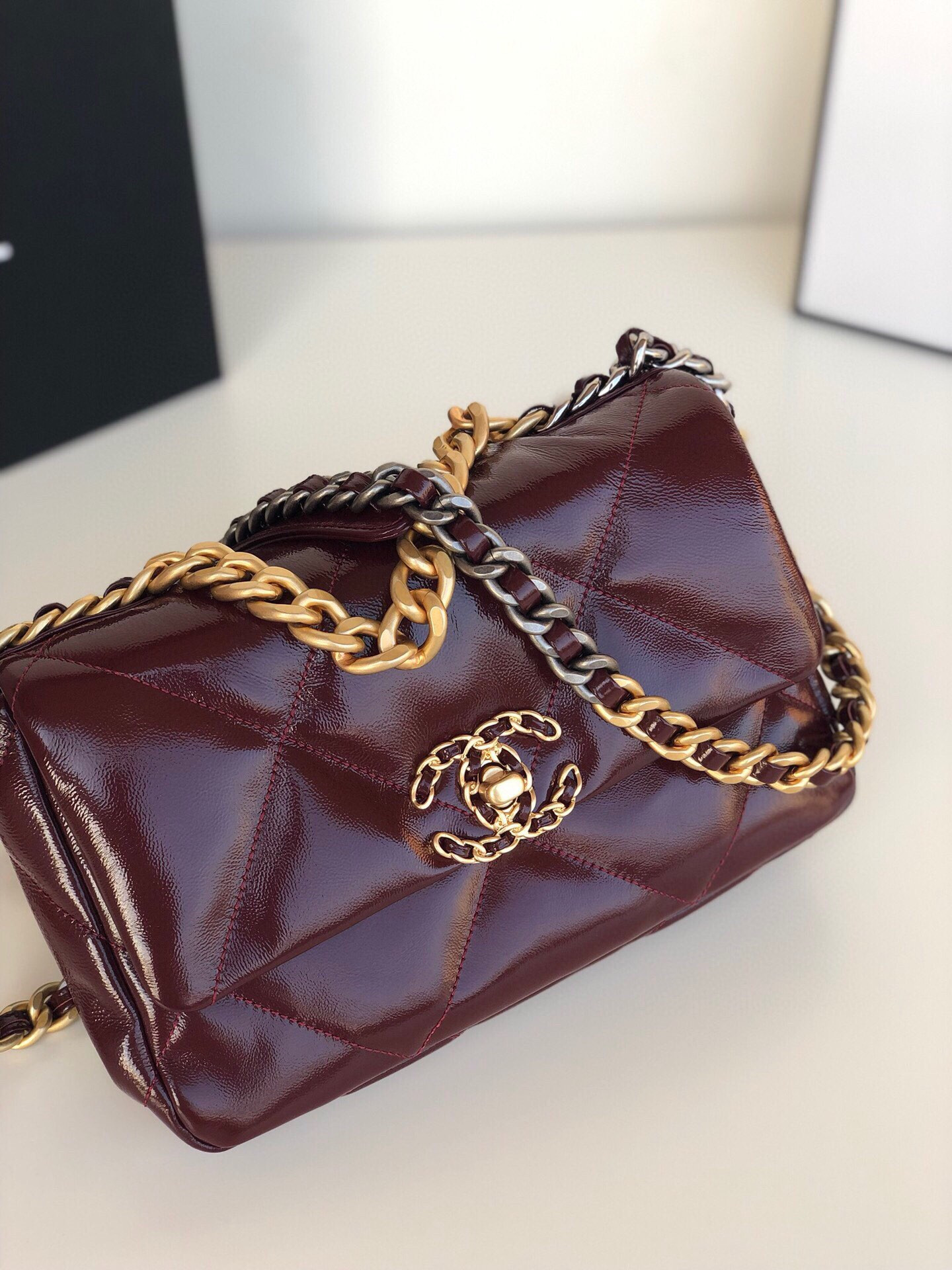 Ch**el 19 HANDBAG Shiny Leather, Gold-Tone, Silver-Tone & Ruthenium-Finish Metal Dark Red 6.2 × 10.1 × 3.5 in