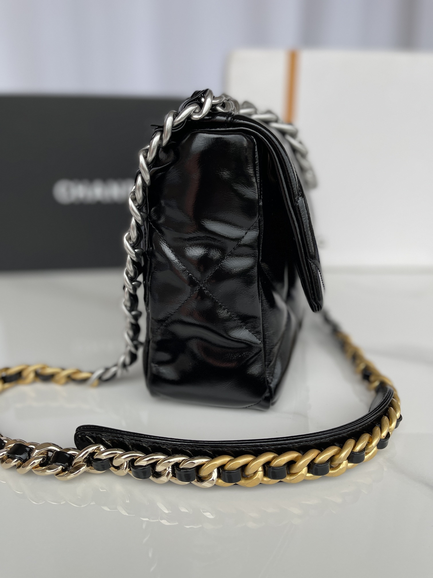 Ch**el 19 LARGE HANDBAG Shiny Leather, Gold-Tone, Silver-Tone & Ruthenium-Finish Metal Black 7.8 × 11.7 × 3.9 in