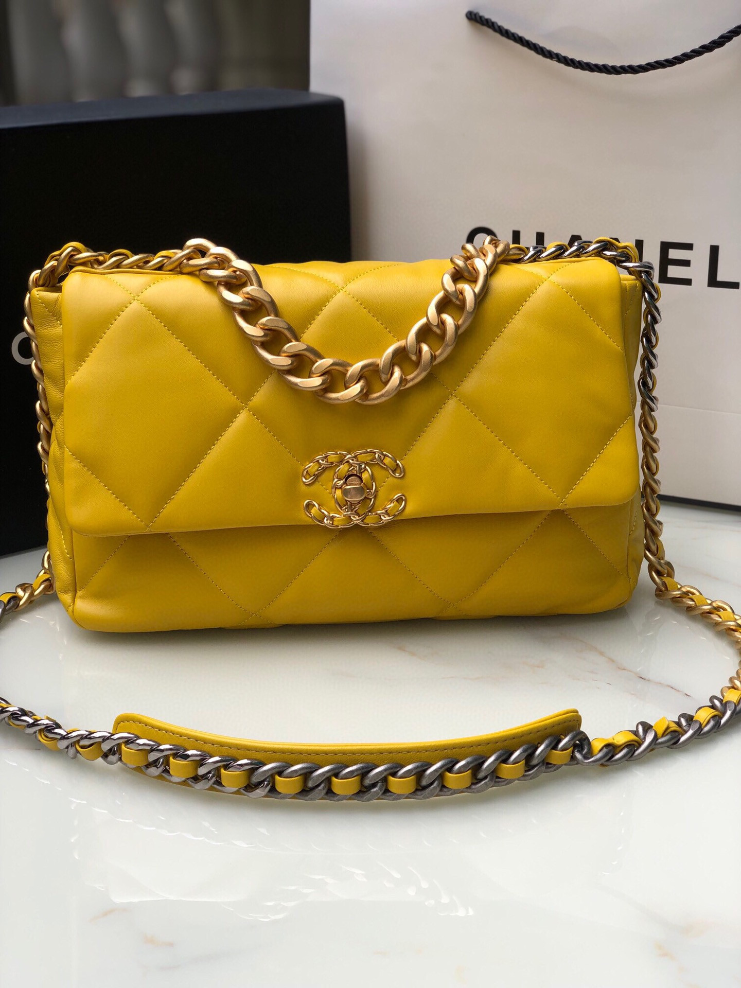 Ch**el 19 LARGE HANDBAG Shiny Leather, Gold-Tone, Silver-Tone & Ruthenium-Finish Metal Yellow 7.8 × 11.7 × 3.9 in