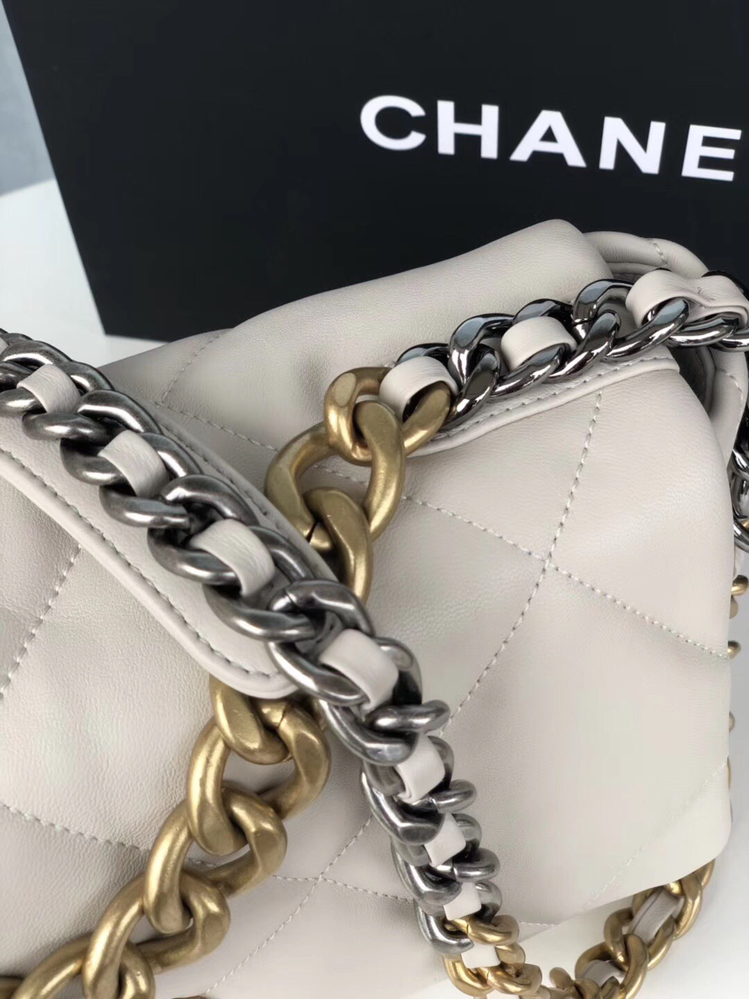 Ch**el 19 LARGE HANDBAG Shiny Leather, Gold-Tone, Silver-Tone & Ruthenium-Finish Metal Beige 7.8 × 11.7 × 3.9 in