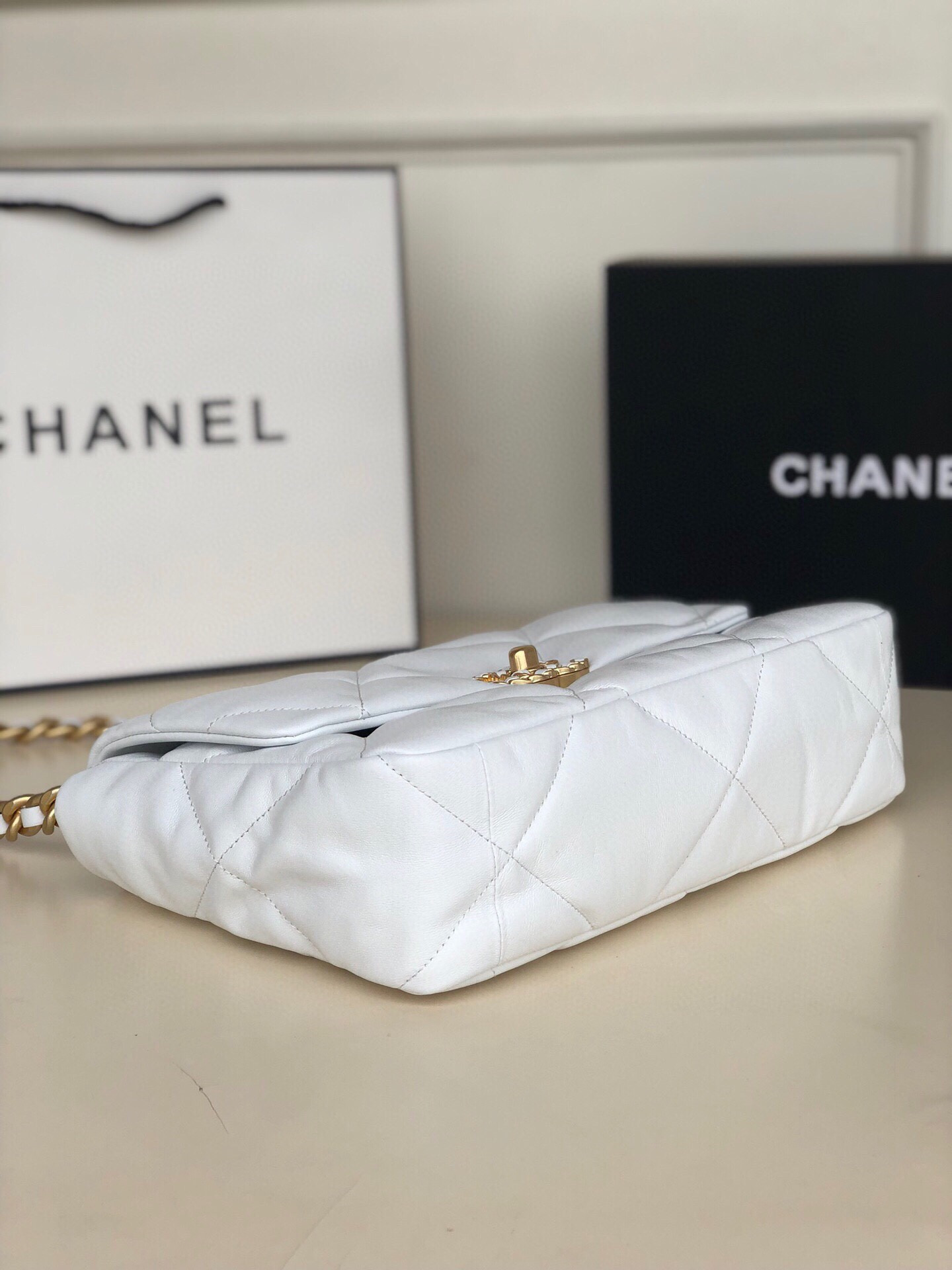 Ch**el 19 LARGE HANDBAG Shiny Leather, Gold-Tone, Silver-Tone & Ruthenium-Finish Metal White 7.8 × 11.7 × 3.9 in