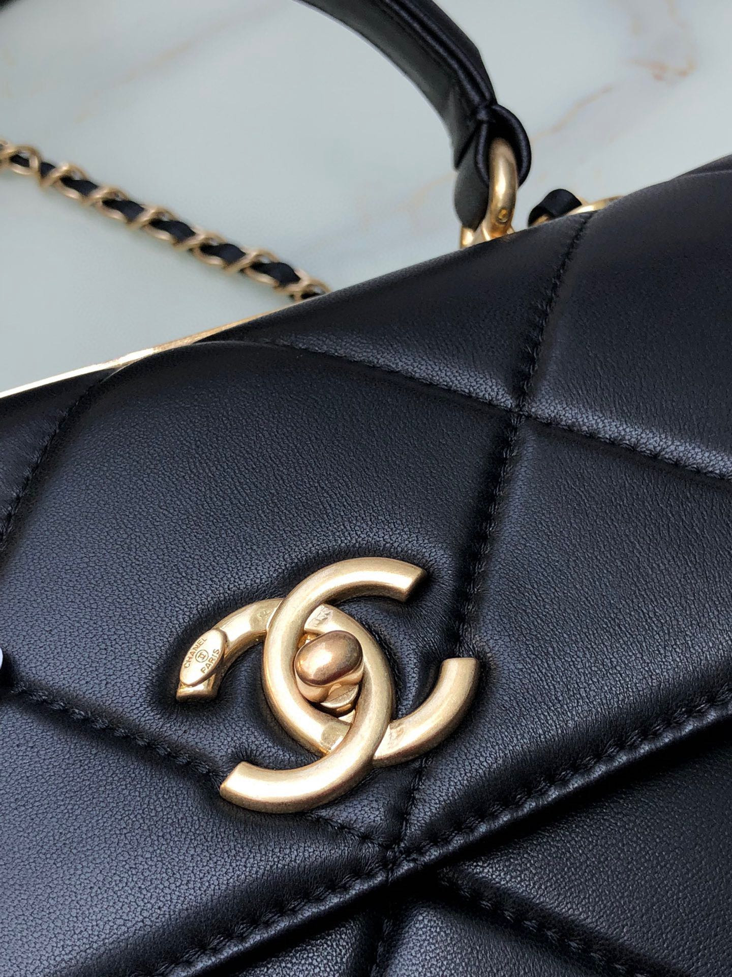 Ch**el FLAP BAG WITH TOP HANDLE 6.6 × 9.8 × 4.7 in